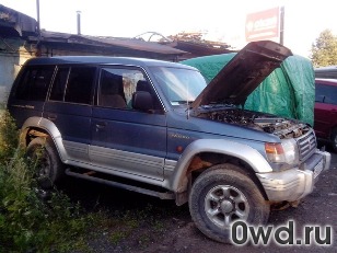 Битый автомобиль Mitsubishi Pajero