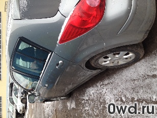 Битый автомобиль Nissan Tiida latio