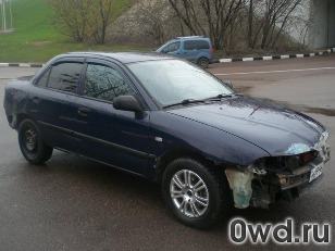 Битый автомобиль Mitsubishi Carisma