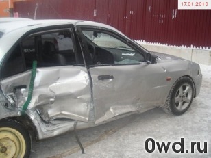 Битый автомобиль Mitsubishi Lancer