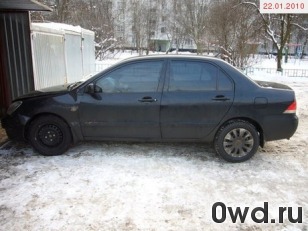 Битый автомобиль Mitsubishi Lancer