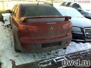 Битый автомобиль Mitsubishi Lancer