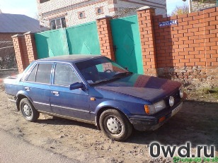 Битый автомобиль Mazda 323