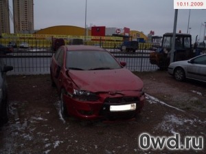 Битый автомобиль Mitsubishi Lancer