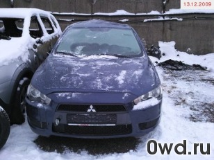 Битый автомобиль Mitsubishi Lancer