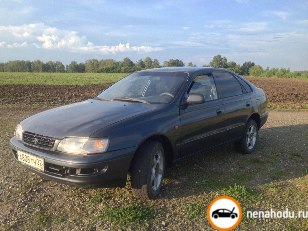 Битый автомобиль Toyota Carina