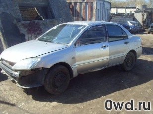 Битый автомобиль Mitsubishi Lancer