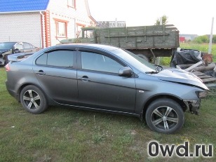 Битый автомобиль Mitsubishi Lancer