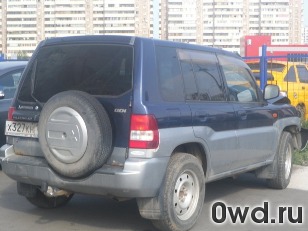 Битый автомобиль Mitsubishi Pajero