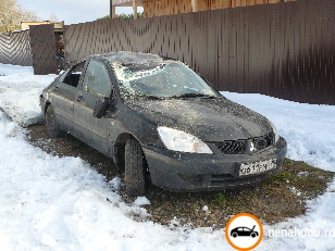 Битый автомобиль Mitsubishi Lancer